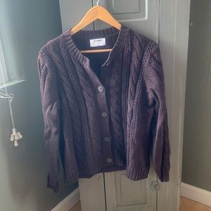 Chocolate brown button down sweater with cable knit accents and tortoise buttons